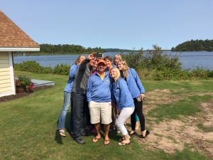 We have a small team, but we are growing together! Here's picture of us taking the "selfie."